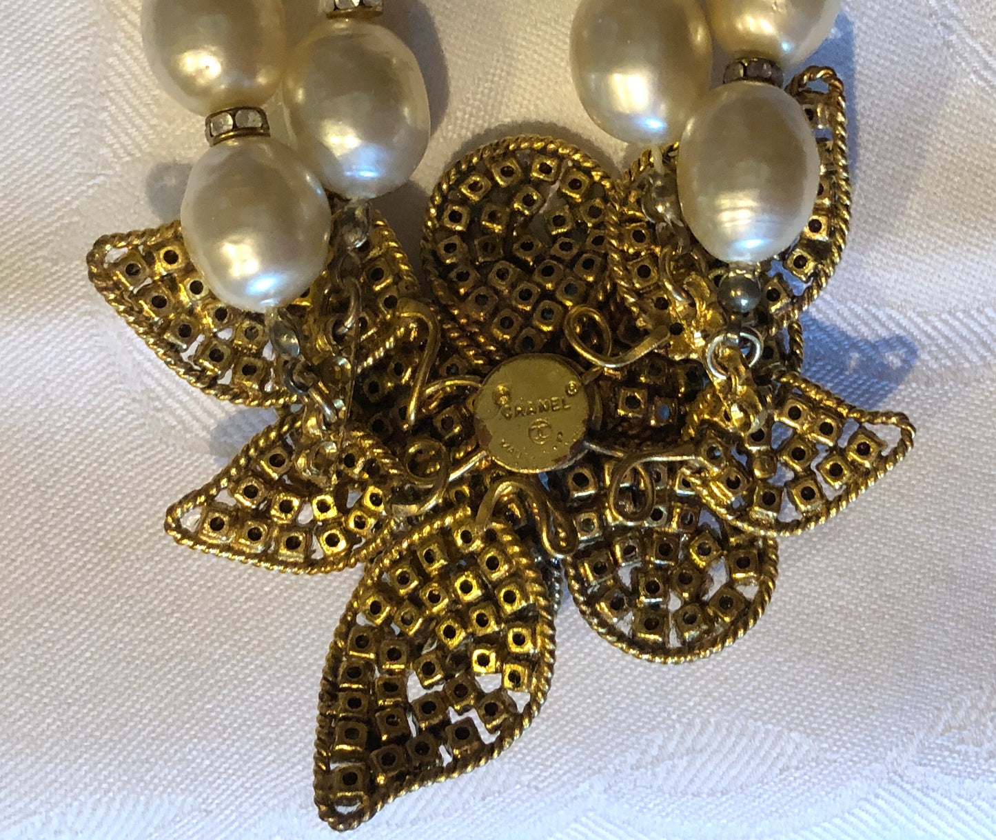 CHANEL Double Pearl Strand Crystal Camellia Necklace