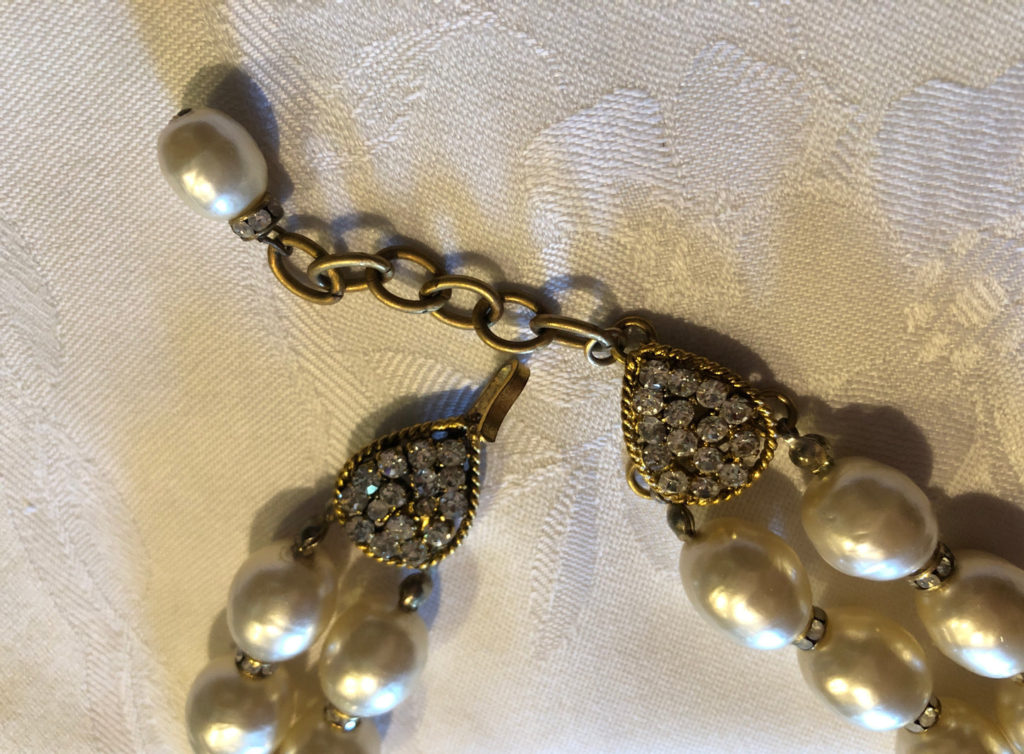 CHANEL Double Pearl Strand Crystal Camellia Necklace